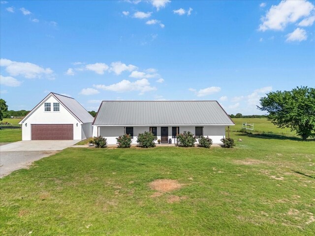 2250 Poolville Cut Off Rd, Poolville, TX 76487 - view of front of home featuring a front yard, driveway, and metal roof