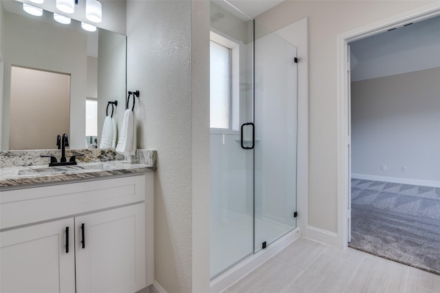 1618 Wildflower Dr, Waxahachie, TX 75165 - full bath with a shower stall, vanity, and baseboards