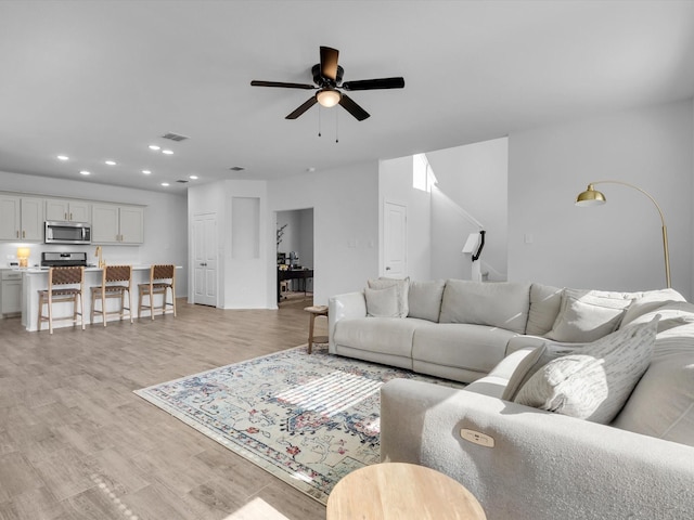 1705 Wayne Ln, Celina, TX 75009 - living room with recessed lighting, a ceiling fan, and light wood-type flooring