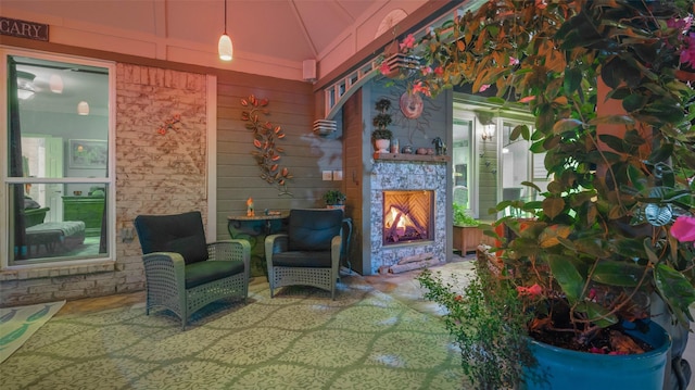 119 Palomino Ct, Shady Shores, TX 76208 - living area with a lit fireplace and lofted ceiling