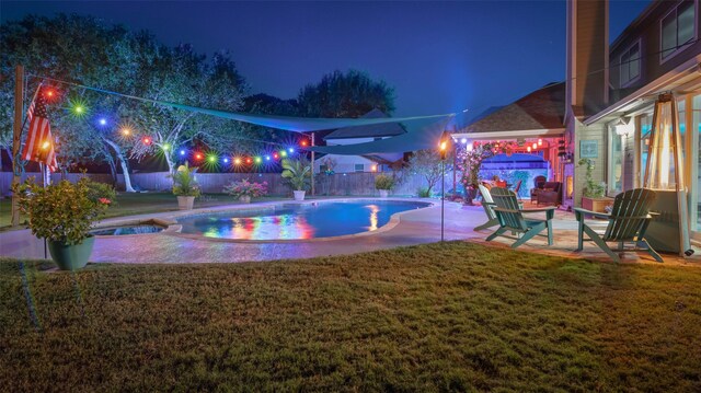 119 Palomino Ct, Shady Shores, TX 76208 - pool at night featuring a patio area