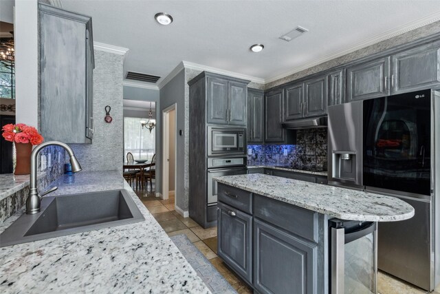 119 Palomino Ct, Shady Shores, TX 76208 - kitchen featuring stainless steel appliances, a sink, wine cooler, under cabinet range hood, and tasteful backsplash
