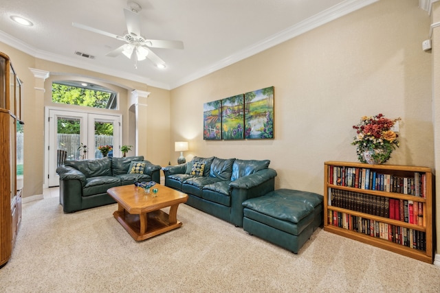 2806 Northwood St, Grapevine, TX 76051 - living room with carpet flooring, ceiling fan, ornamental molding, decorative columns, and french doors