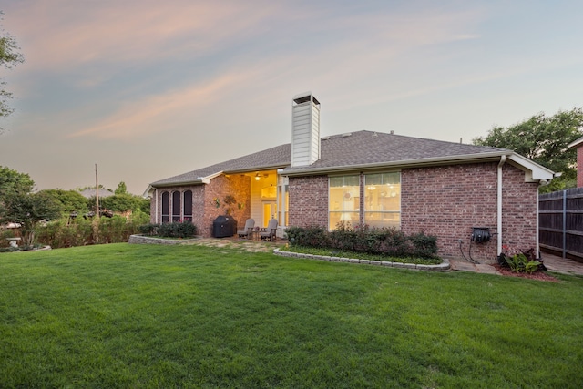2806 Northwood St, Grapevine, TX 76051 - view of front of house with brick siding, a chimney, and roof with shingles