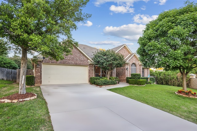 2806 Northwood St, Grapevine, TX 76051 - view of front facade with brick siding, concrete driveway, and a garage