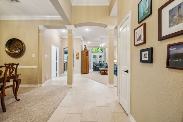 2806 Northwood St, Grapevine, TX 76051 - hall featuring ornate columns, ornamental molding, baseboards, light tile patterned floors, and recessed lighting