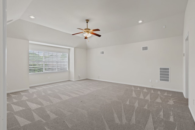 1205 Wynne Dr, Garland, TX 75044 - spare room featuring light carpet, lofted ceiling, ceiling fan, recessed lighting, and baseboards