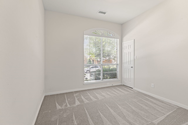 1205 Wynne Dr, Garland, TX 75044 - carpeted spare room featuring baseboards