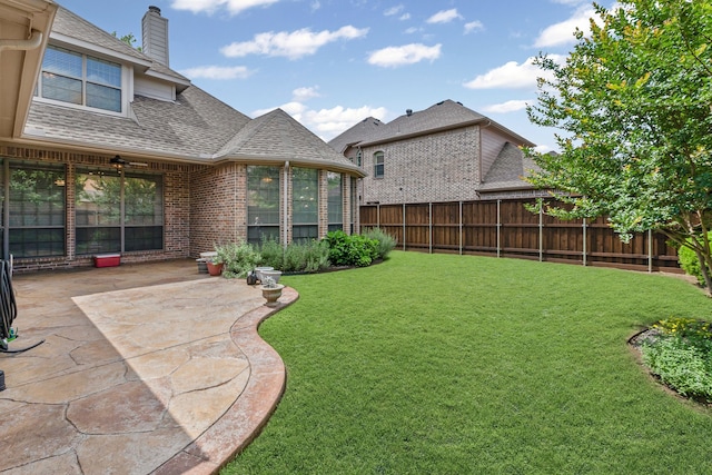 1205 Wynne Dr, Garland, TX 75044 - view of yard with a patio