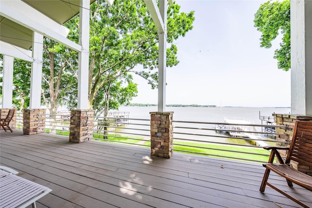 1232 Whispering Springs Dr, Tool, TX 75143 - wooden terrace with a water view and covered porch