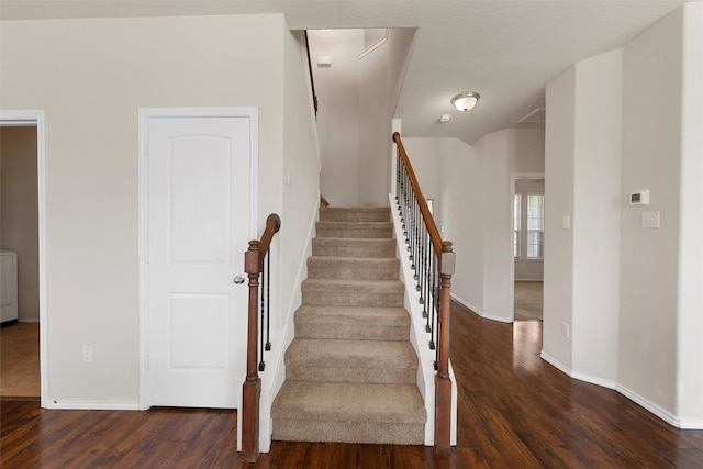 11108 Buzzard Gulch Dr, Waco, TX 76708 - stairs with wood finished floors, baseboards, and washer / clothes dryer