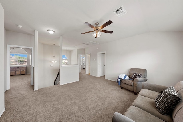 11108 Buzzard Gulch Dr, Waco, TX 76708 - living area with ceiling fan, light colored carpet, attic access, and baseboards