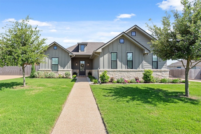 10136 Braided Briar Ln, Waco, TX 76712 - view of front of house with board and batten siding, stone siding, and a shingled roof