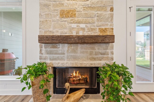 10136 Braided Briar Ln, Waco, TX 76712 - detailed view of a fireplace and wood finished floors