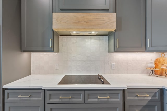 10136 Braided Briar Ln, Waco, TX 76712 - kitchen featuring gray cabinets, black electric stovetop, range hood, and decorative backsplash