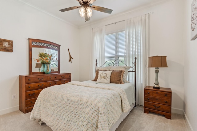 10136 Braided Briar Ln, Waco, TX 76712 - carpeted bedroom with ornamental molding, baseboards, and ceiling fan