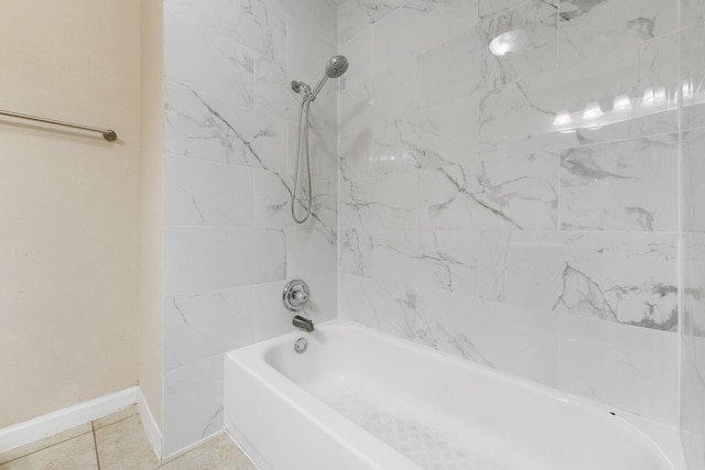 908 Cherry Laurel Ln, Arlington, TX 76012 - bathroom with tile patterned flooring, shower / bathtub combination, and baseboards