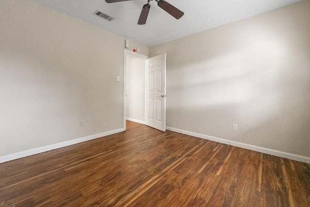 908 Cherry Laurel Ln, Arlington, TX 76012 - spare room featuring a ceiling fan, baseboards, and wood finished floors