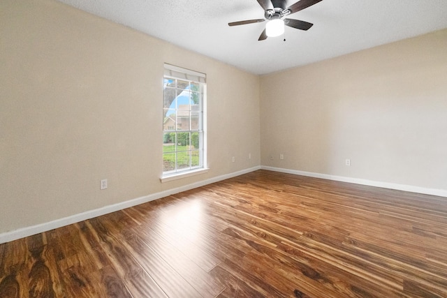 908 Cherry Laurel Ln, Arlington, TX 76012 - unfurnished room featuring wood finished floors, baseboards, and a ceiling fan