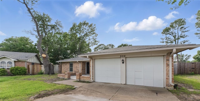 908 Cherry Laurel Ln, Arlington, TX 76012 - view of front of property featuring brick siding, an attached garage, and driveway
