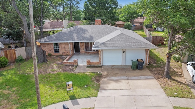 908 Cherry Laurel Ln, Arlington, TX 76012 - ranch-style house with roof with shingles, brick siding, a garage, driveway, and a chimney