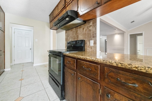 908 Cherry Laurel Ln, Arlington, TX 76012 - kitchen with black range with electric stovetop, under cabinet range hood, baseboards, light tile patterned floors, and light stone counters
