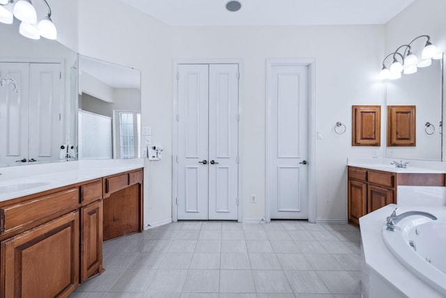 420 Bee Caves Rd, Lucas, TX 75002 - full bathroom featuring a jetted tub, two vanities, and baseboards