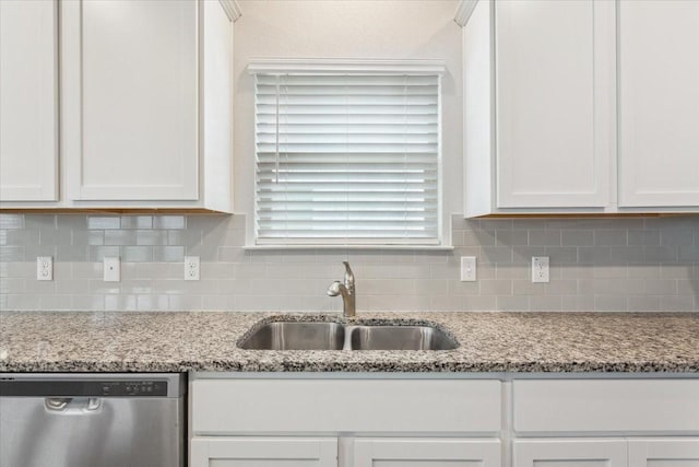 3220 Marston Rd, Lorena, TX 76655 - kitchen with stainless steel dishwasher, a sink, white cabinets, and tasteful backsplash