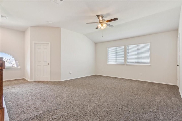 3220 Marston Rd, Lorena, TX 76655 - spare room featuring carpet, a ceiling fan, healthy amount of natural light, vaulted ceiling, and baseboards