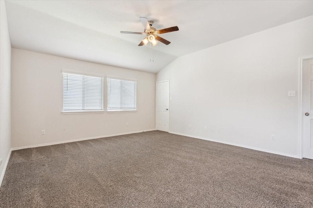 3220 Marston Rd, Lorena, TX 76655 - spare room with ceiling fan, dark carpet, baseboards, and vaulted ceiling