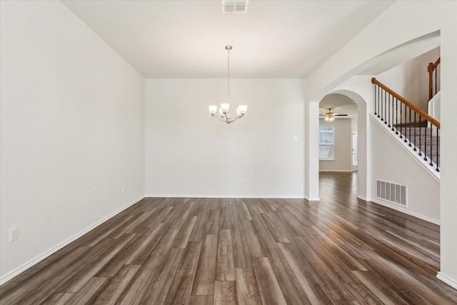 3220 Marston Rd, Lorena, TX 76655 - unfurnished dining area with dark wood finished floors, arched walkways, a chandelier, and baseboards