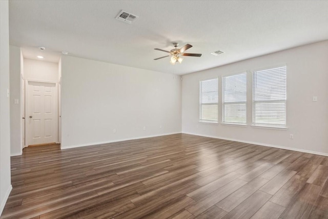 3220 Marston Rd, Lorena, TX 76655 - empty room with ceiling fan, dark wood-style flooring, and baseboards