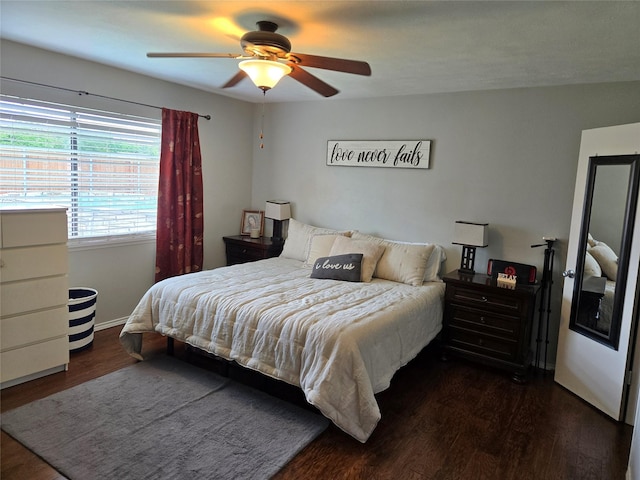 bedroom with wood finished floors and ceiling fan