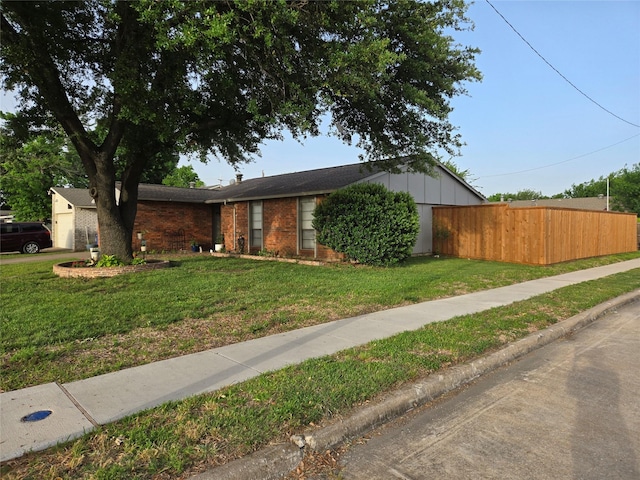 view of front facade featuring brick siding and board and batten siding
