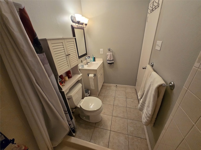 bathroom featuring vanity, toilet, and tile patterned floors