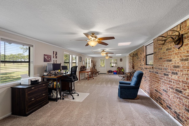 818 Country Club Rd, Bowie, TX 76230 - office featuring brick wall, light colored carpet, a ceiling fan, plenty of natural light, and a textured ceiling