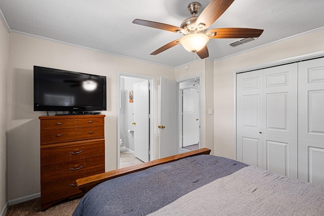 818 Country Club Rd, Bowie, TX 76230 - bedroom with ornamental molding, a closet, baseboards, and a ceiling fan