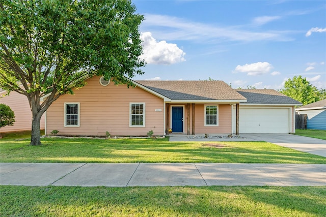 2813 Dana Ln, Denton, TX 76209 - ranch-style home with a garage, concrete driveway, a front lawn, and roof with shingles