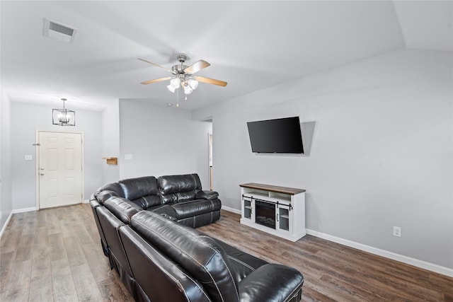 2813 Dana Ln, Denton, TX 76209 - living room with wood finished floors, baseboards, a chandelier, a ceiling fan, and lofted ceiling