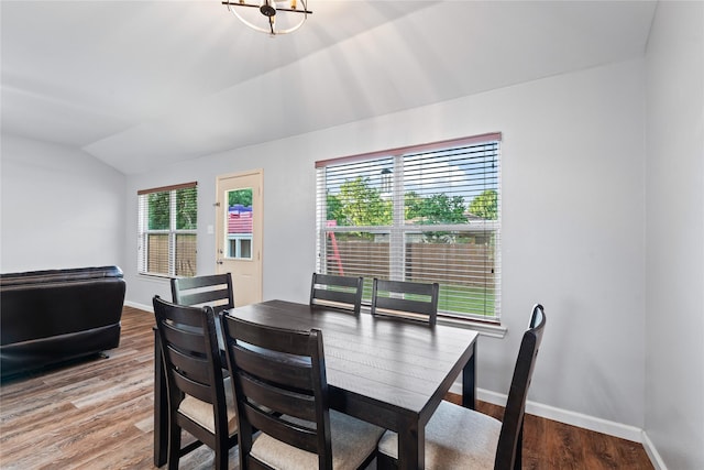 2813 Dana Ln, Denton, TX 76209 - dining area with vaulted ceiling, wood finished floors, and baseboards
