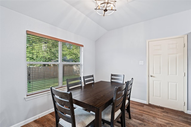 2813 Dana Ln, Denton, TX 76209 - dining space featuring a chandelier, lofted ceiling, dark wood-style floors, and baseboards