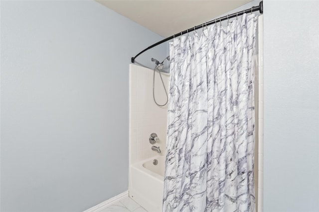 2813 Dana Ln, Denton, TX 76209 - bathroom with shower / bath combo and baseboards