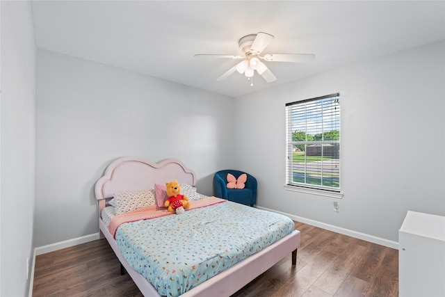 2813 Dana Ln, Denton, TX 76209 - bedroom with wood finished floors, baseboards, and a ceiling fan