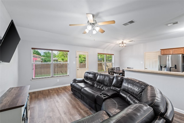 2813 Dana Ln, Denton, TX 76209 - living room featuring a ceiling fan, dark wood-style floors, baseboards, and lofted ceiling