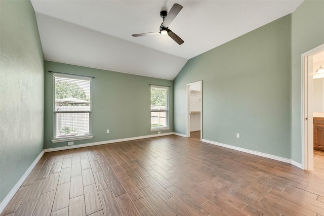 712 Britain Way, Wylie, TX 75098 - empty room with wood finished floors, healthy amount of natural light, ceiling fan, and vaulted ceiling