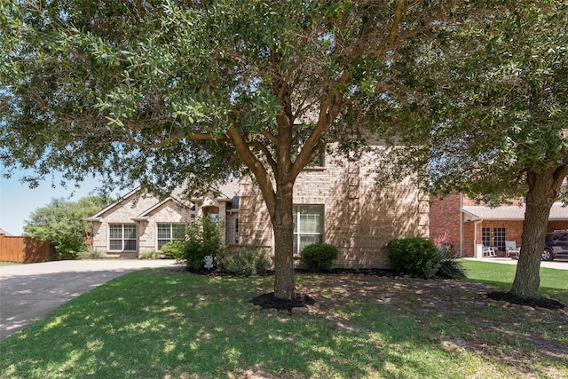 712 Britain Way, Wylie, TX 75098 - obstructed view of property with brick siding