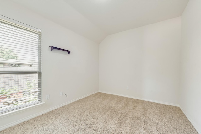 712 Britain Way, Wylie, TX 75098 - spare room featuring carpet, vaulted ceiling, and baseboards