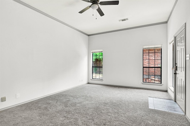 1407 W Mulberry St, Sherman, TX 75092 - carpeted spare room with crown molding, a ceiling fan, and baseboards