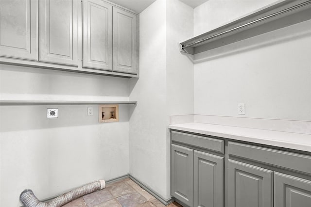 1407 W Mulberry St, Sherman, TX 75092 - washroom featuring cabinet space, hookup for an electric dryer, washer hookup, and baseboards