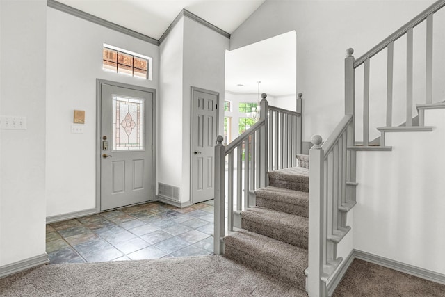 1407 W Mulberry St, Sherman, TX 75092 - entrance foyer featuring high vaulted ceiling, baseboards, stairway, and crown molding
